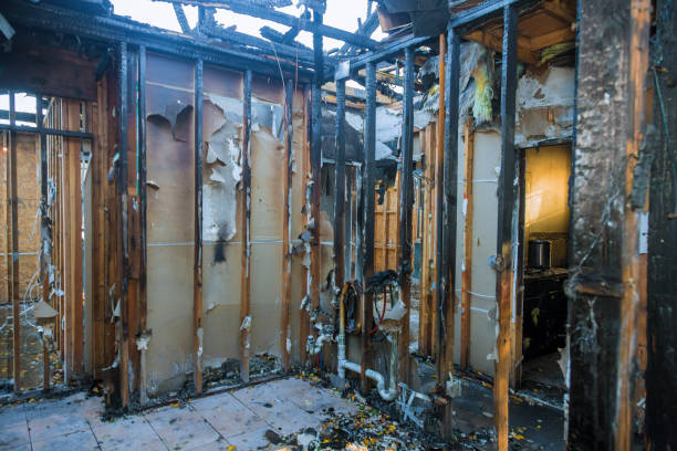 Professional Emergency Fire Cleanup technician working in Norwood, NY